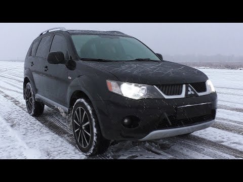 Видео: Обзор Mitsubishi Outlander XL 2.4 МККП