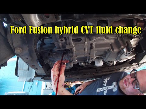 Видео: Замена трансмиссионной жидкости CVT для гибридного Ford Fusion 2017 года