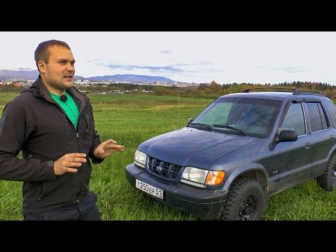 Видео: Знакомство с  Kia Sportage 1 128 л.с. + владелец и эстакада.