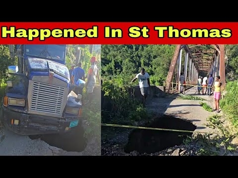 Видео: Огромный грузовик провалился в яму на мосту Изингтон-Бридж в Сент-Томасе после разрушительного ур...