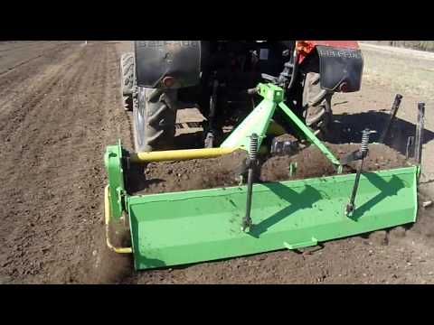 Видео: Фрезерование земли с фрезой BOMET. МТЗ-82