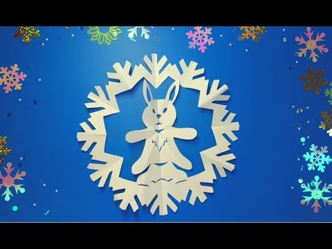 Видео: Как вырезать новые, необычные снежинки из бумаги в школу и садик. How to cut a paper snowflake