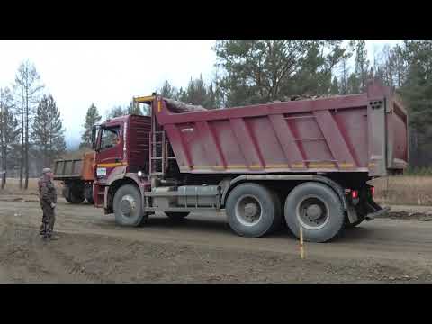 Видео: Камаз 6580 Разгрузка ! Строим дорогу на БАЙКАЛ ! часть 4