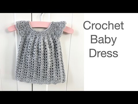 Видео: Вязаное крючком детское платье серого цвета | примерка 0-6 месяцев | вязание крючком для начинающ...
