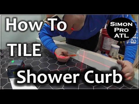 Видео: Как установить душевой бордюр из плитки и цельного душевого бордюра