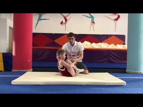 Видео: Упражнение "Кувырок назад"