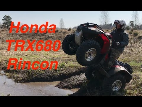 Видео: Обзор квадроцикла Honda Rincon TRX680