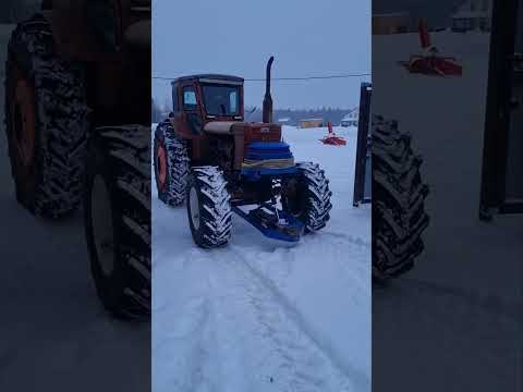 Видео: установка свечей накала и больших колёс передних на трактор т-40ам ипро снегоуборщик Уралец