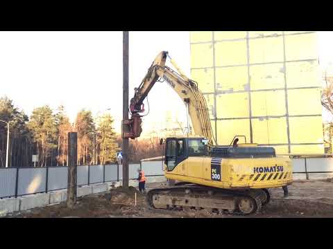 Видео: Трубный вибропогружатель Movax на Komatsu PC300. ЖК Кузьминский лес
