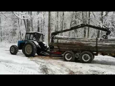 Видео: Разгрузка лесовозного прицепа АРМАДА + насос МТЗ 1221 (Аутригеры? Нет. Не слышал)