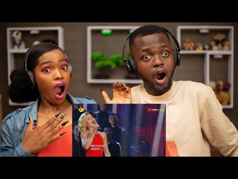 Видео: OUR FIRST TIME HEARING Polina Gagarina (Поли́на Гага́рина) - "Katiusha (Катюша)" REACTION!!!😱