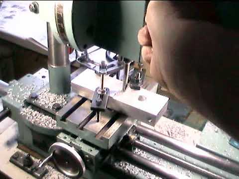 Видео: Токарный станок Универсал 2  Изготовление приклона гитары сменных шестерён.