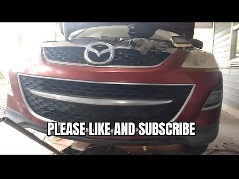 Видео: Снятие генератора Mazda CX-9 2010 года с двигателя 3.7