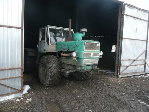 Видео: Как поменять масло на тракторе Т-150К с ЯМЗ-236.