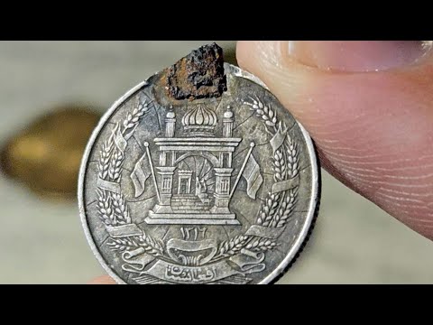 Видео: Есть ли что-нибудь стоящее на распродаже монет со всего мира?