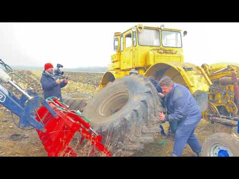 Видео: Снимаем пробитые колёса с К700.