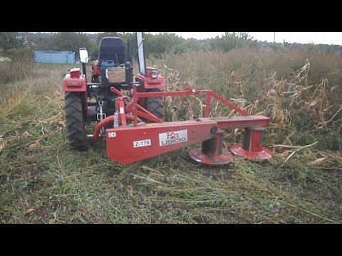 Видео: мини трактор и роторная косилка / это надо знать