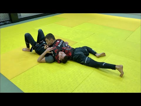 Видео: Север-Юг NO GI Удушающий приём ( Лев Гладких )