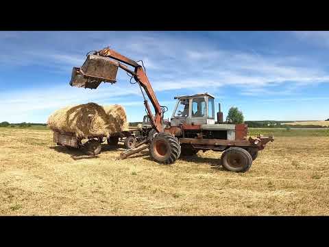 Видео: Редки кадры! Карпатец грузит рулоны сена!