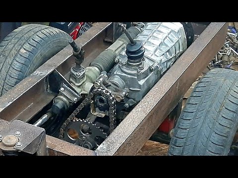 Видео: Самодельный минитрактор переломка. Серия 3. Рулевое управление, КПП, ограничитель переворота. diy
