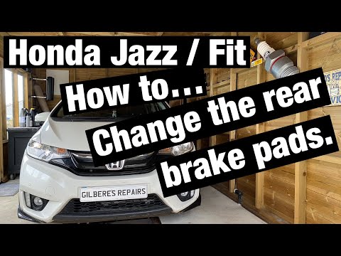 Видео: Замена задних тормозных колодок Honda Jazz Fit