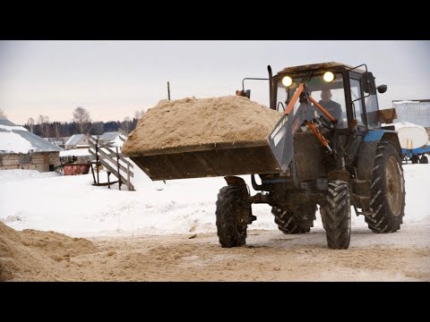 Видео: Отзыв на погрузчик FRONTLIFT M1200, ковш и сельскохозяйственные вилы