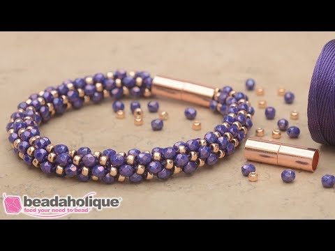 Видео: Как сделать наборы для плетения браслетов «Кумихимо» из спиральных бусин класса «Делюкс» от Beada...