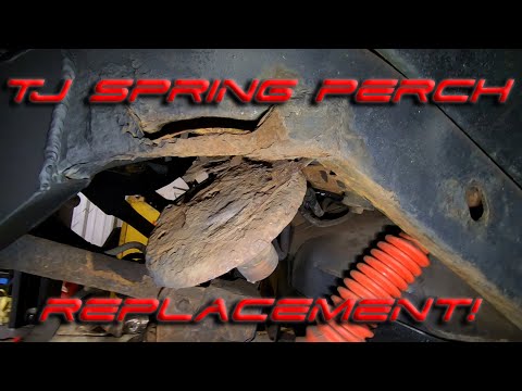 Видео: Замена пружины Jeep Wrangler.