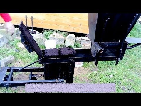 Видео: универсальный пресс для производства брикетов из торфа и опилок.