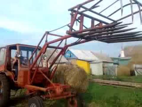 Видео: Т-16 трактор КУН уборка саломы
