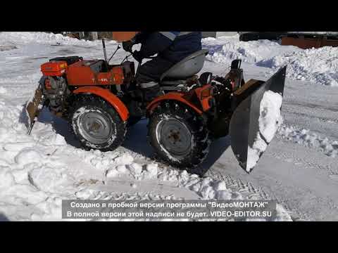 Видео: TZ-4K-14 Новый поворотный отвал.