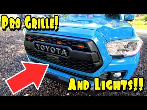 Видео: Установка решетки радиатора TRD Pro Grille на Toyota Tacoma 2016-2020 с подсветкой решетки! (ЭПИЗ...
