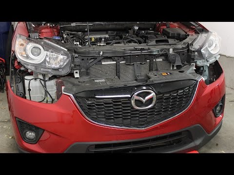 Видео: Снятие и установка переднего бампера Mazda CX-5 (2013+)