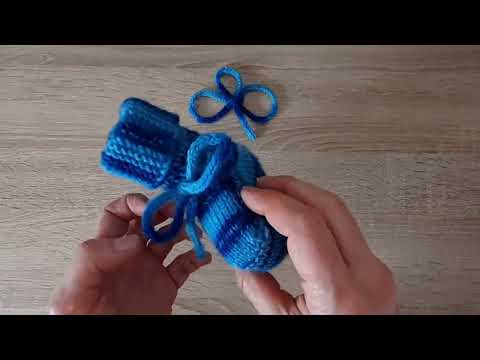 Видео: Как связать шнурок спицами.