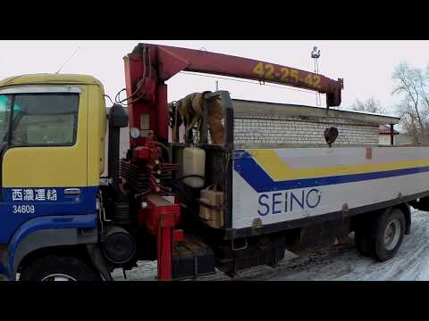 Видео: Nissan Diezel манипулятор, кран борт, обзор