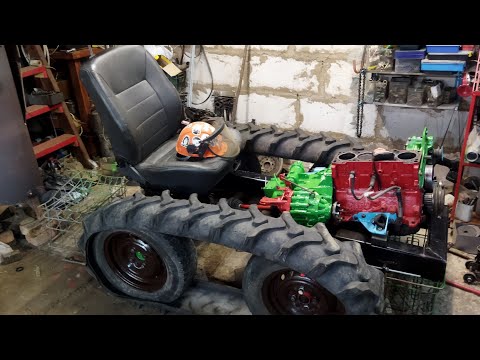 Видео: Гусеничный минитрактор,натяжной механизм гусениц.