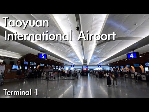 Видео: Прогулка по международному аэропорту Таоюань T1 | Прогулка в аэропорту