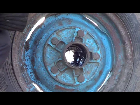 Видео: Замена подшипников ступиц колёс культиватора КПС-8.