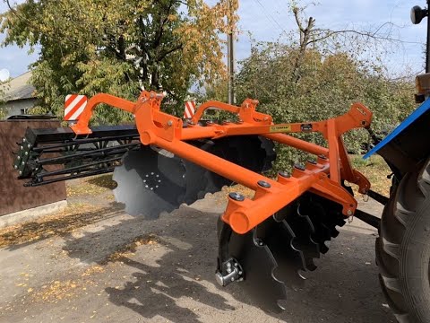 Видео: Таурус 2.4Н-01. Дискование бороной на разных агрофонах - кукуруза, подсолнух, сидераты, целина.