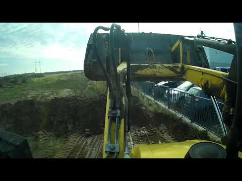 Видео: Трудовые будни. NEW HOLLAND B115B