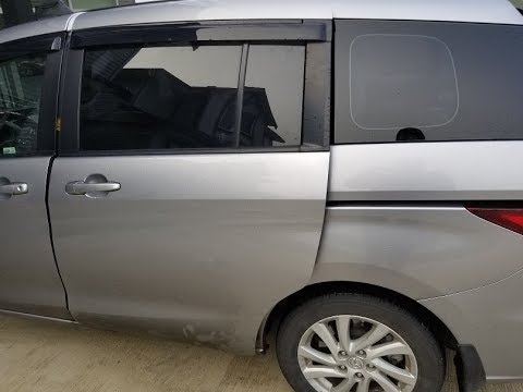 Видео: Замена ролика раздвижной двери Mazda 5 2012 года