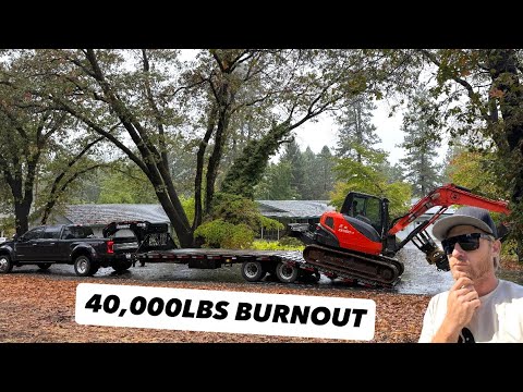 Видео: Неудачное время для переезда на новое место работы! Ford F450 пробуксовывает на крутом склоне.