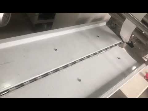 Видео: Упаковочный станок для курут по один штук