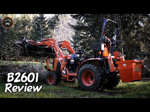 Видео: Обзор Kubota B2601: плюсы, минусы и советы! Компактный трактор