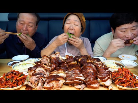 Видео: Полный коллагена! Йокбал (Вареные свиные лапки) !! - Шоу еды Mukbang.