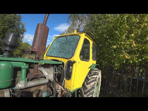Видео: Лобовуха в дребезги. ЮМЗ 6 замена стекла