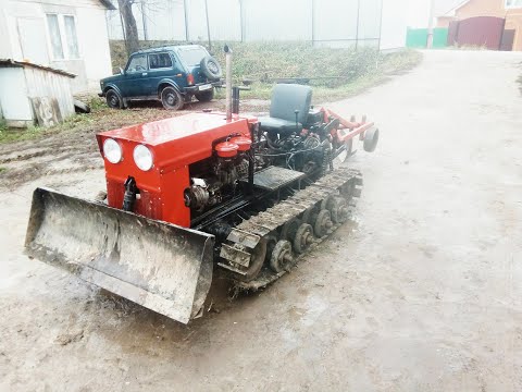 Видео: самодельный мини гусеничный трактор обзор поворотного механизма MINI DOZER