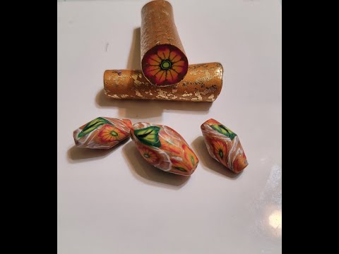 Видео: Осенний цветок из полимерной глины и бусины