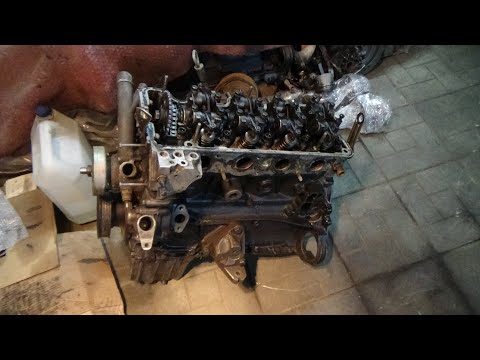 Видео: Разбираем двигатель М102 2.0 Мерседес