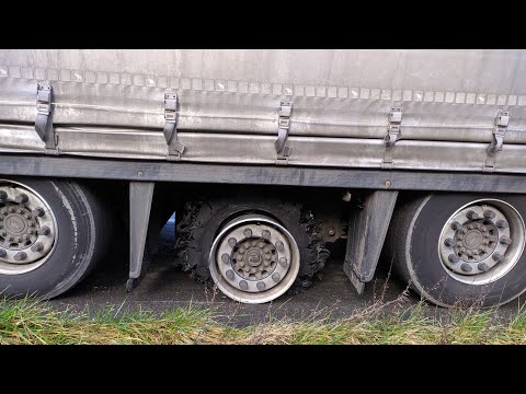 Видео: Меняем колесо на гружёном полуприцепе на автобане